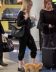 jennifer-lawrence-with-her-dog-at-jfk-airport-in-new-york-october-29-2016_630080646.jpg